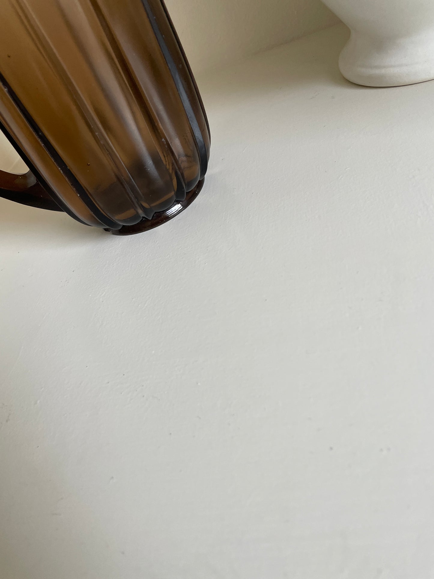 Glass jug in brown glass