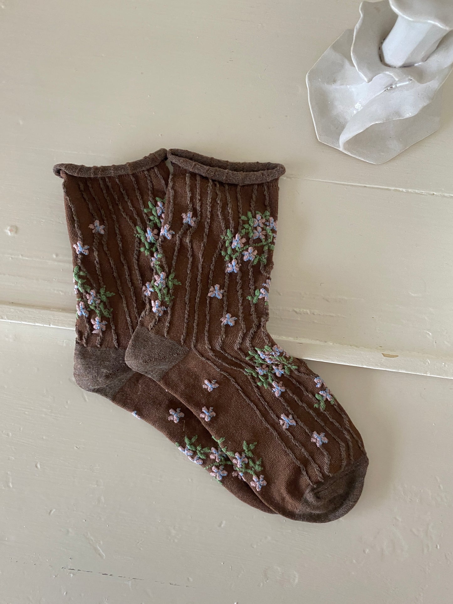 Strømper brune med motiv