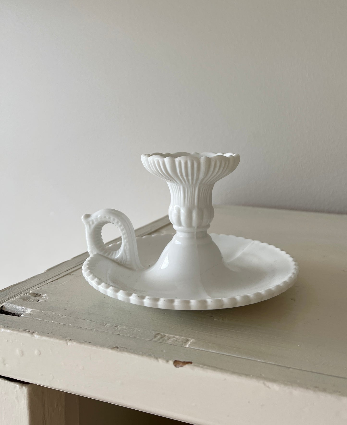 Lysestage med fine detaljer