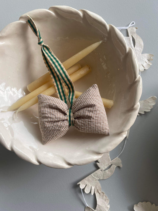 Handmade bow sewn in leftover fabric